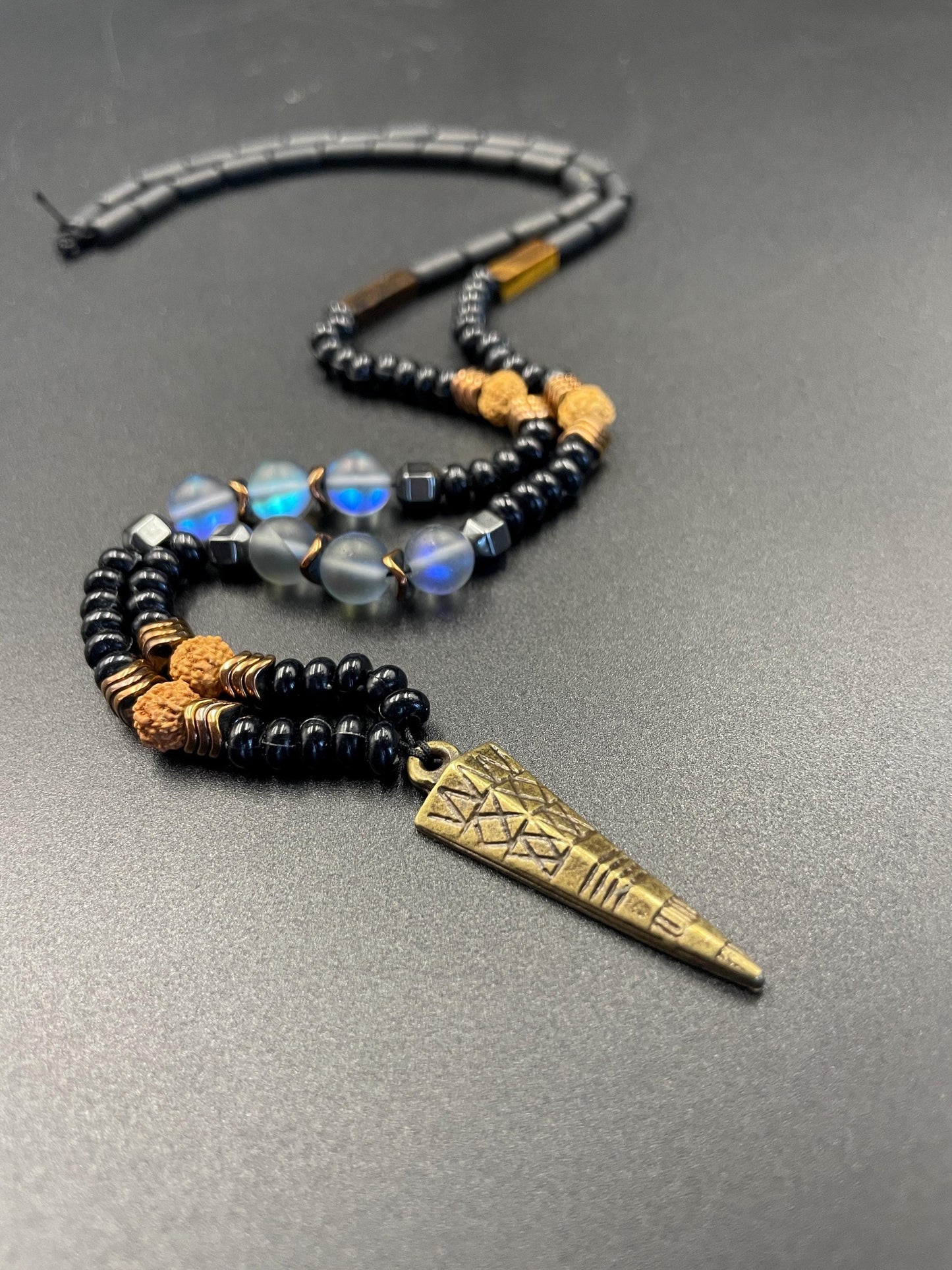Antique Archer Necklace – Blue Thermal Gemstone • Tiger Eye • Hematite • Rudraksha Seed • Men’s Spiritual Amulet • Handmade Tribal Jewelry