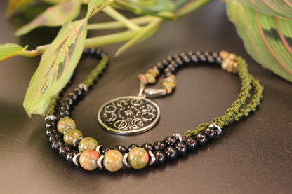 Necklace made of natural stone - unakite - with a moon phases pendant